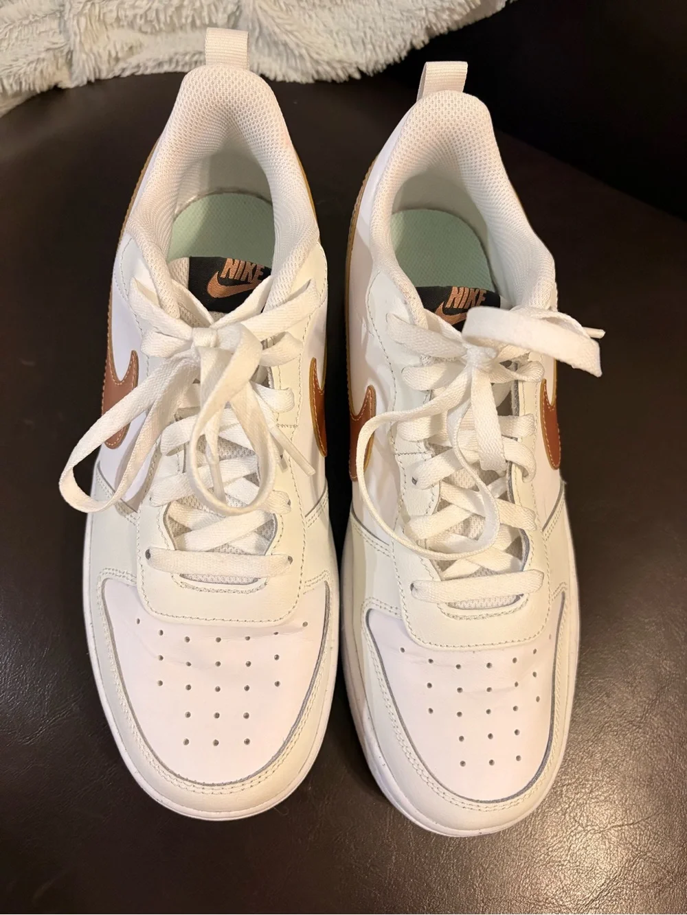 Nike Kids White Sneakers with Tan Swoosh